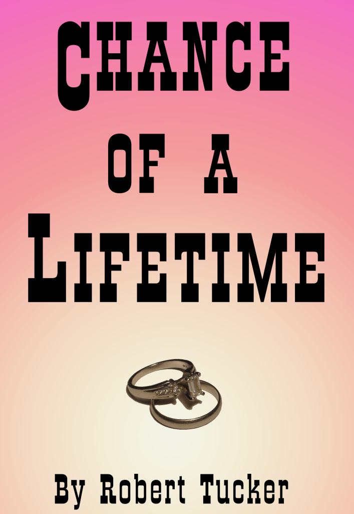 Chance of a Lifetime by Robert Tucker. Wedding rings on a pink-hued background.